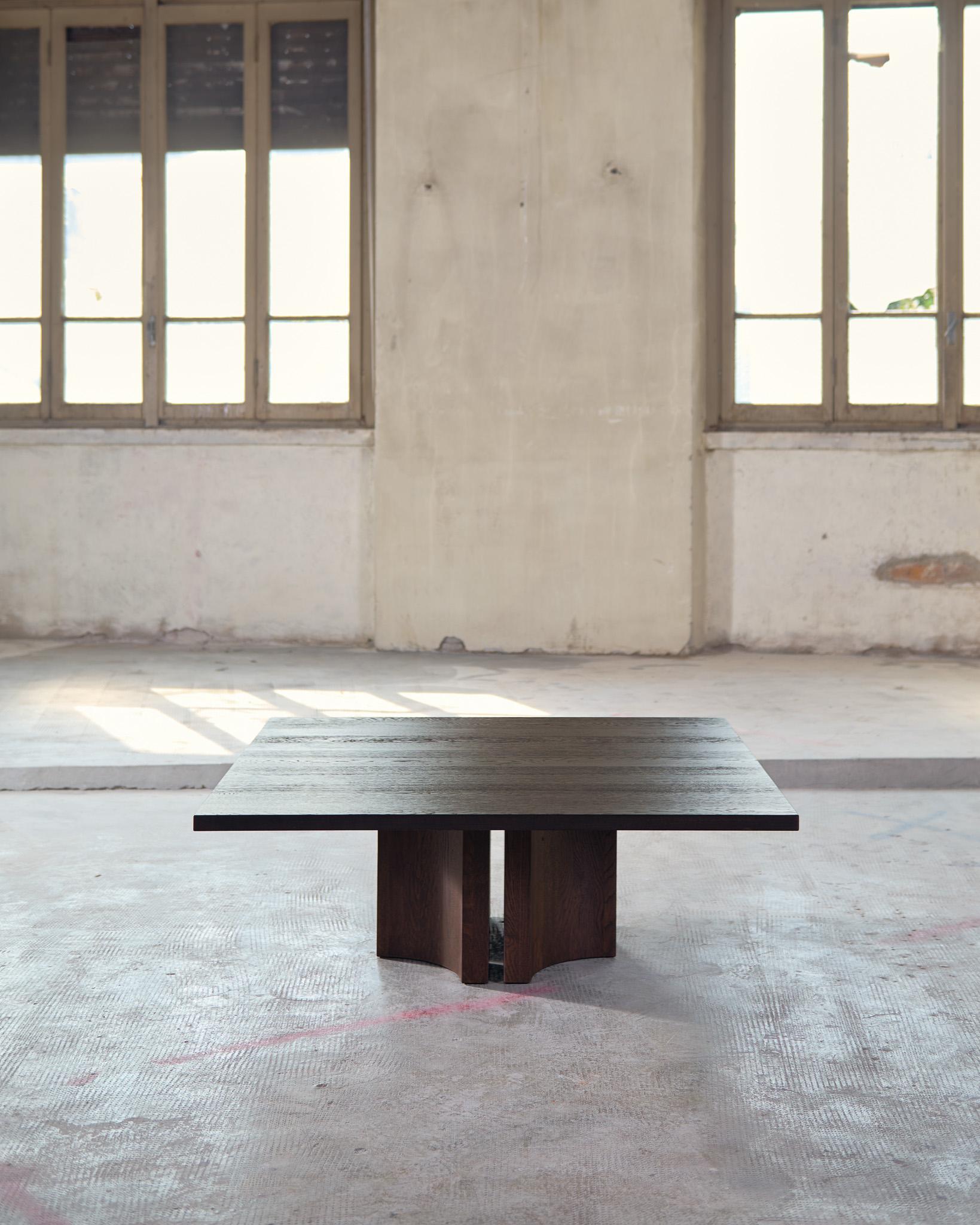 Inspired by light breaking through narrow voids in architectural structures, Aperta features a precise slit, creating a sense of lightness to its solid form. 
The Aperta Coffee Table Round has manually adaptable legs, allowing for 4 distinct