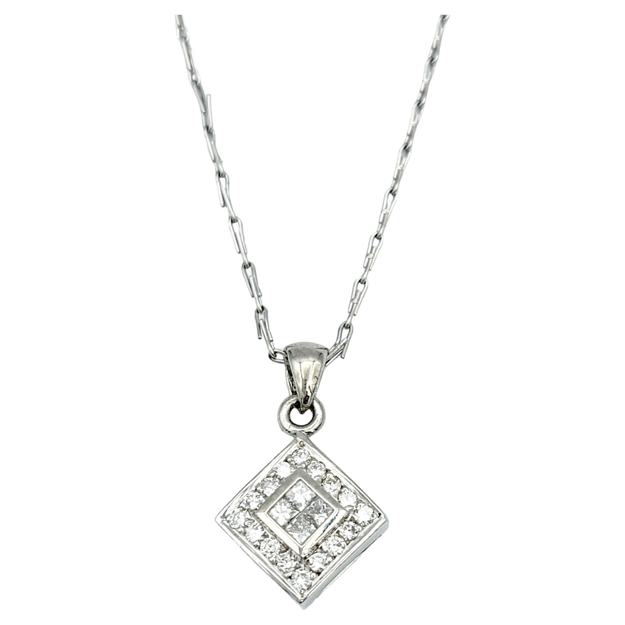 Drape yourself in the epitome of sophistication with this platinum pendant necklace, a stunning embodiment of modern elegance. The square pendant is a masterpiece in itself, featuring four princess-cut, invisible-set diamonds at its core, creating a