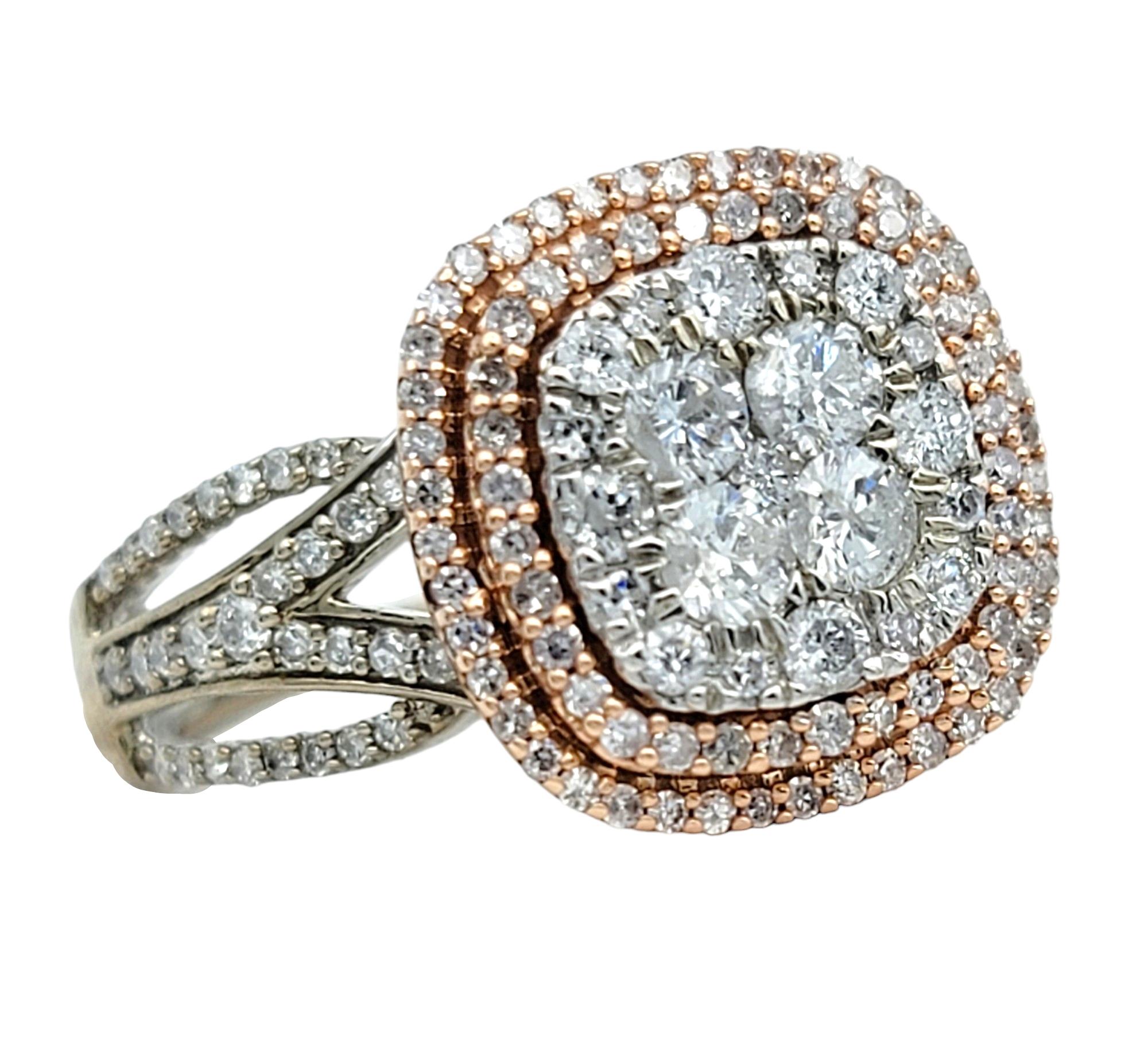 Ring Size: 6.5

This exquisite diamond ring features a dazzling double halo design with a unique split shank design. The stunning piece is meticulously crafted in both rose and white 10 karat gold, creating a harmonious blend of warmth and