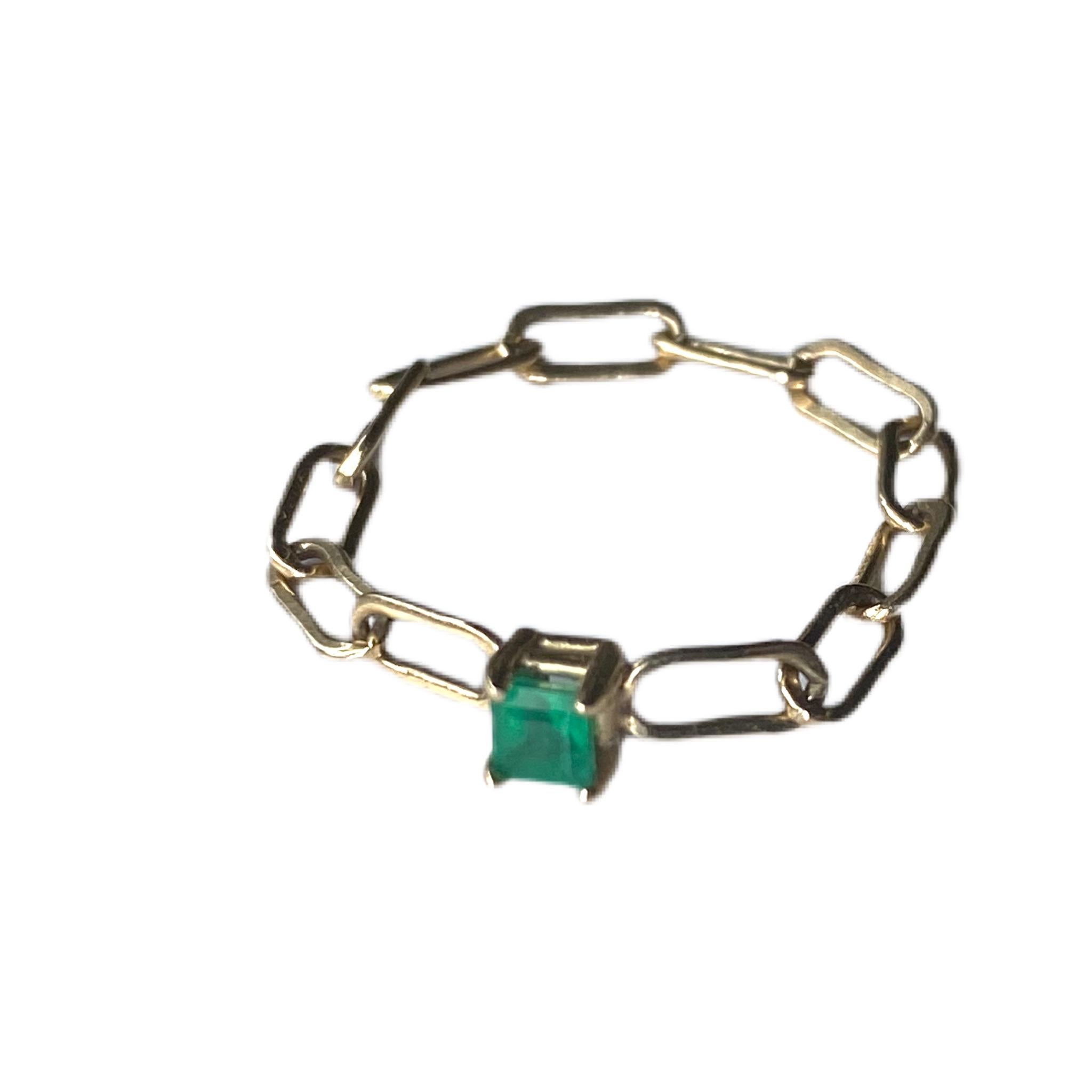 Squared Emerald Chain Ring Stackable in 14 Karat Gold By Designer J Dauphin

Last 4 images show same style with heart shaped gems Emerald, Tanzanite and Opal and a round Brilliant cut Alexandrite.

Made to order in any size 3-4 Weeks to be completed