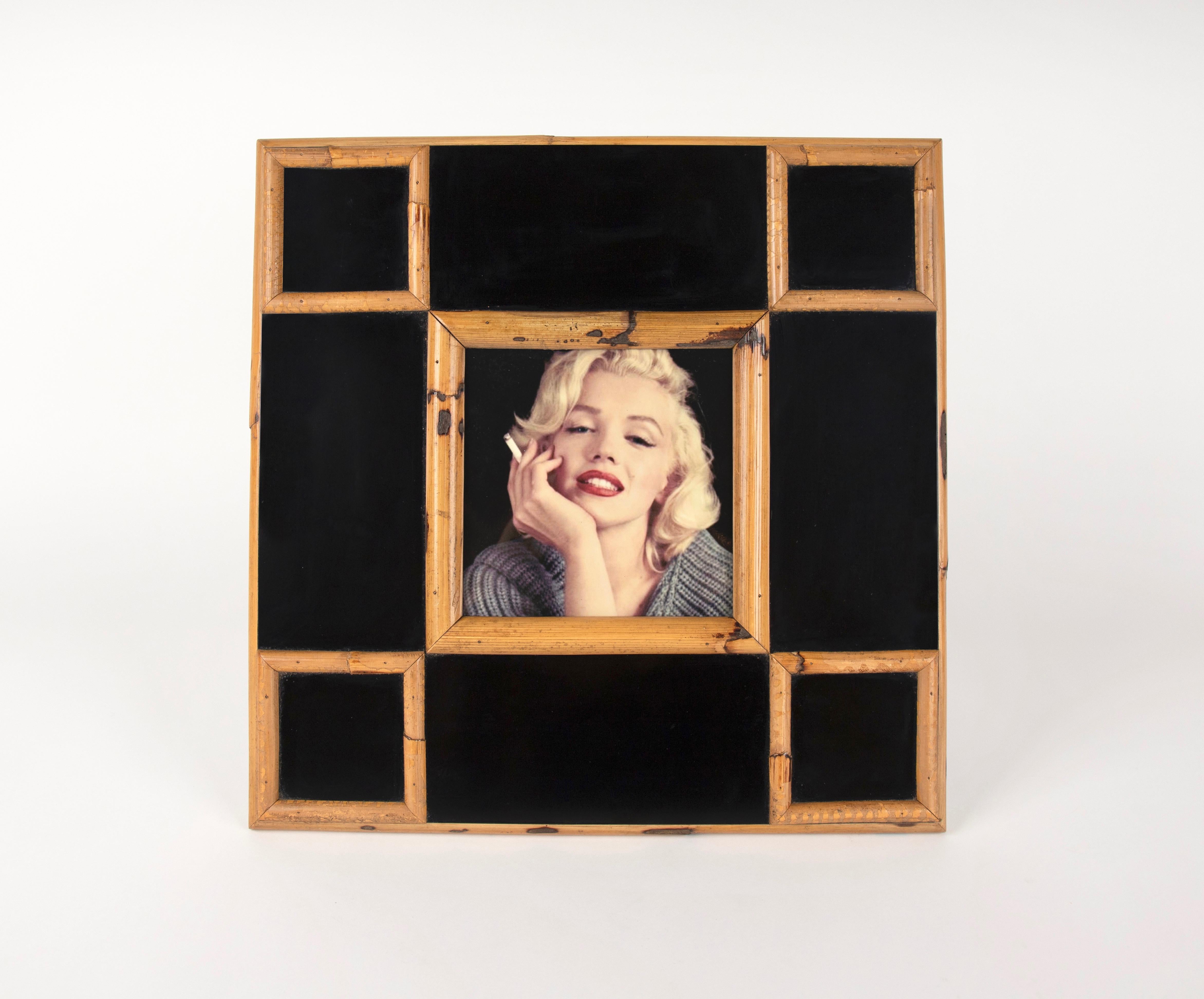 Big squared picture frame in laminate embellished with bamboo squares by the Italian designer Tommaso Barbi. 

Made in Italy in the 1970s.