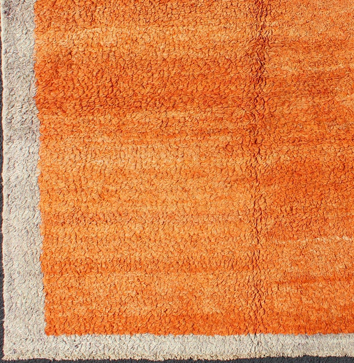 Squared Size Minimalist Tulu rug in Shades of Orange colors and Taupe Border. Vintage Tulu rug With Minimalist Design Rug in Solid Orange and Taupe. Keivan Woven Arts/ rug #EN-3310, Origin/Turkey, Hand knotted vintage rug. Modern design