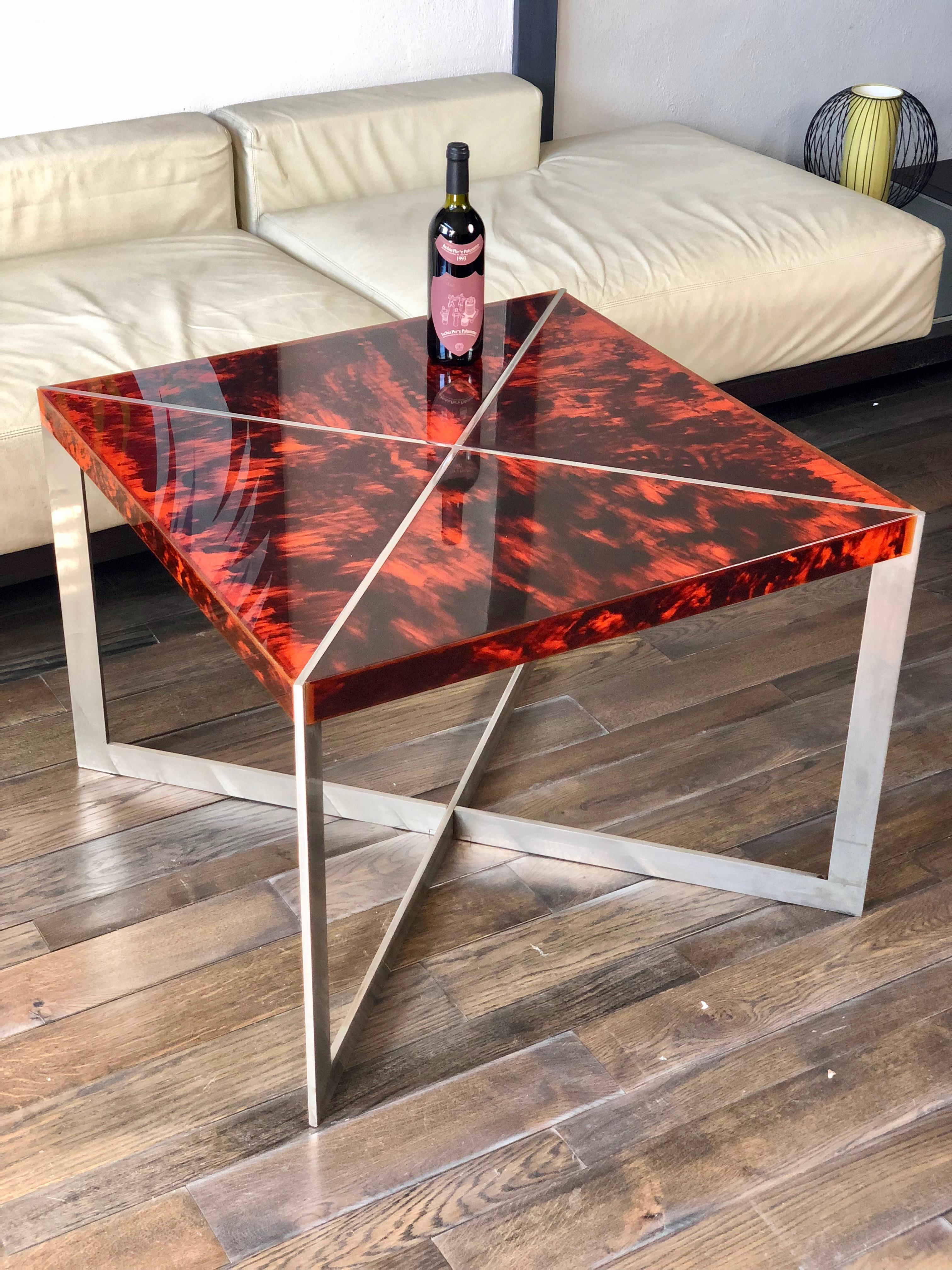 Squared Midcentury table made of a tortoiseshell Lucite surface and a chrome 