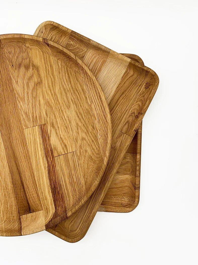 These Wooden Trays are a beautiful addition to any home. Made with high-quality wood and expert carpentry, they're both durable and visually appealing. You can purchase a set or pick the shape you prefer. Plus, they're easy to clean with water and