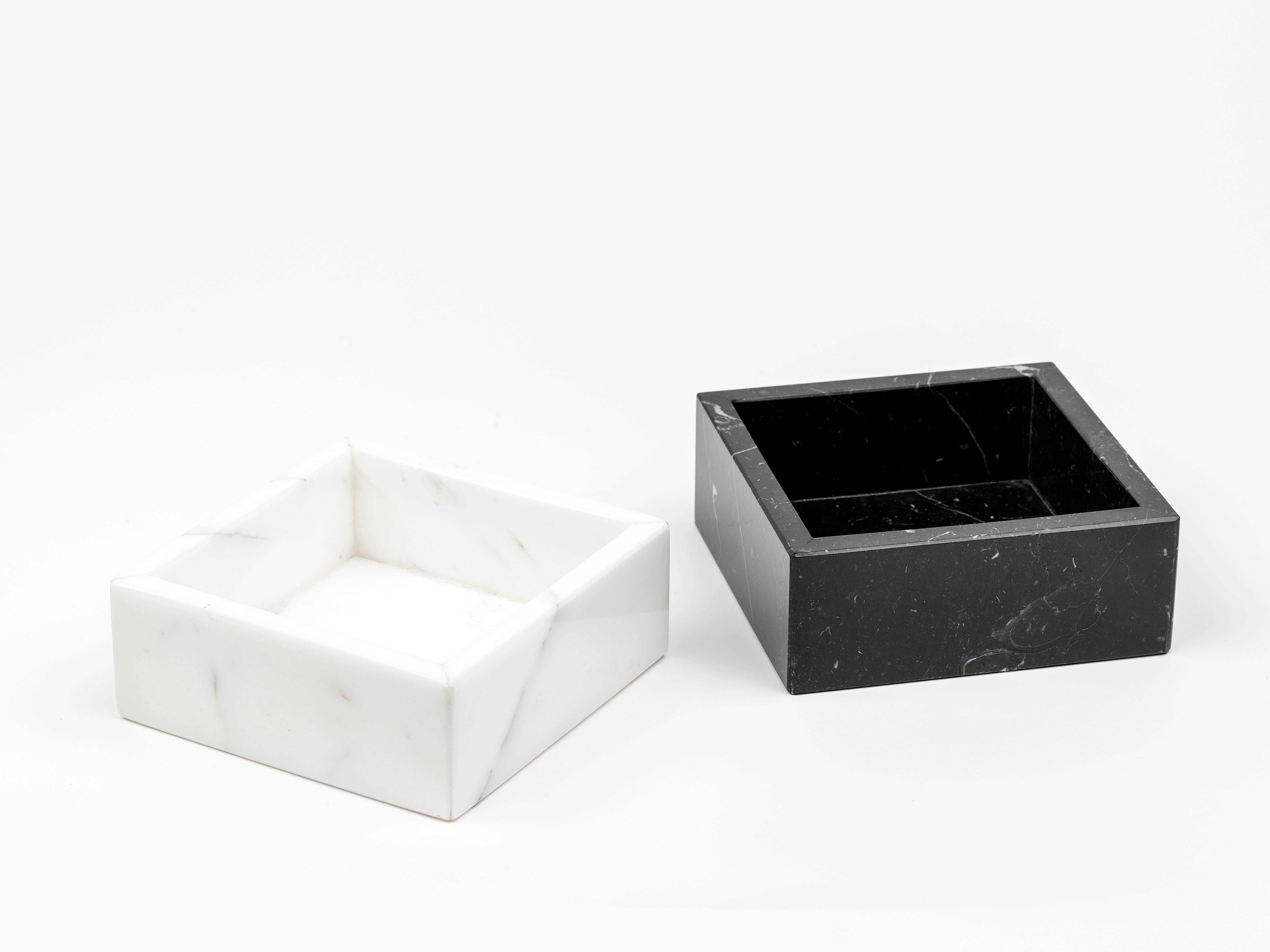Squared white Carrara marble cotton box, ideal for spa, hotel, and private house bathrooms. It can be used also as a dresser valet or for the nice display of sweets and chocolates in the living-room or studio. Each piece is in a way unique (every