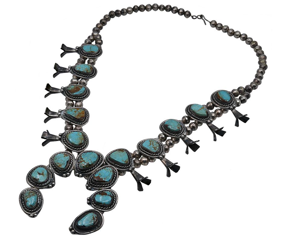 Vintage squash blossom necklace made of cabochon turquoise stones, set in silver.  24