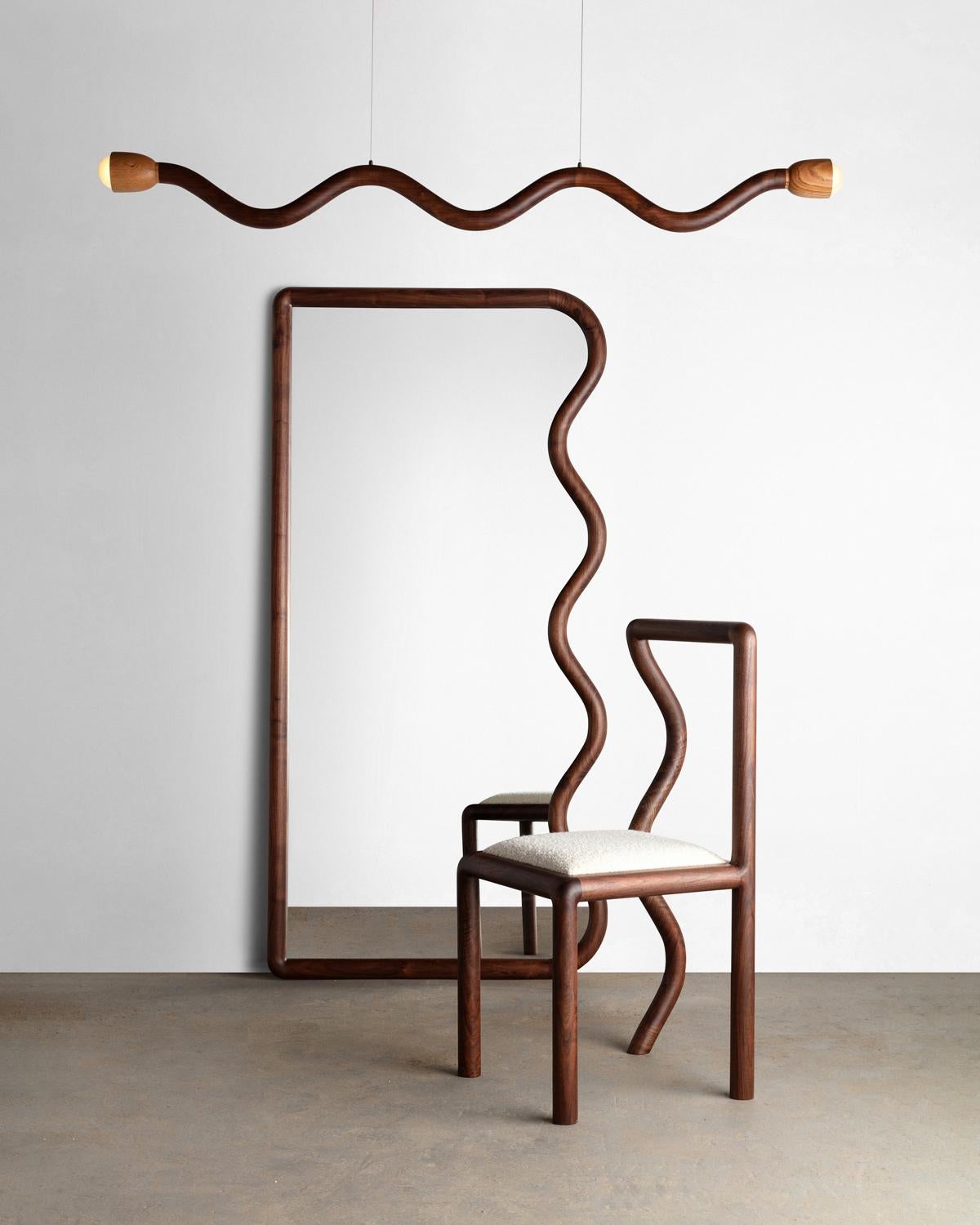 Hand-Carved Squiggle Dining Chair / Hand sculpted Walnut & Natural Bouclé upholstery For Sale