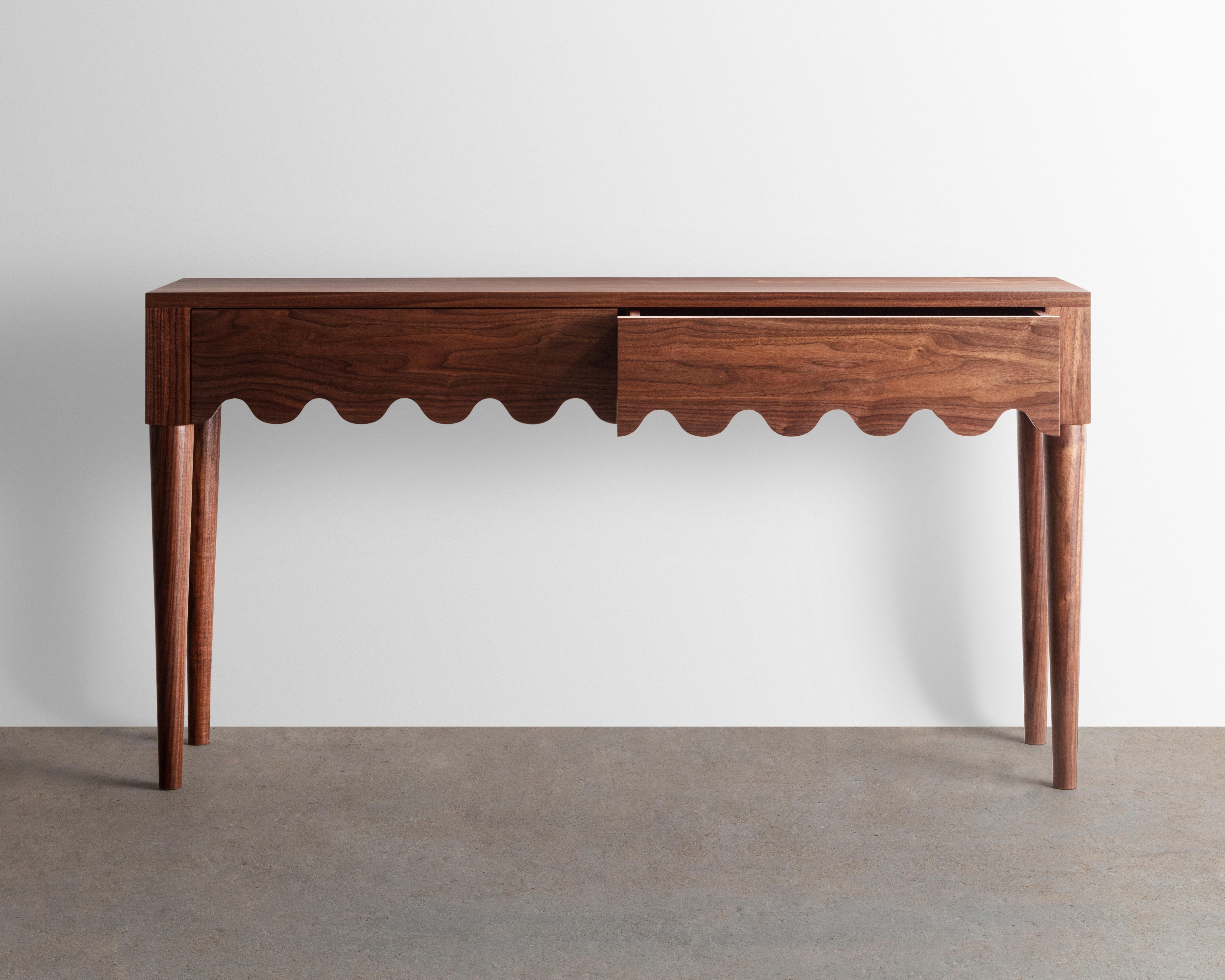 scalloped console table