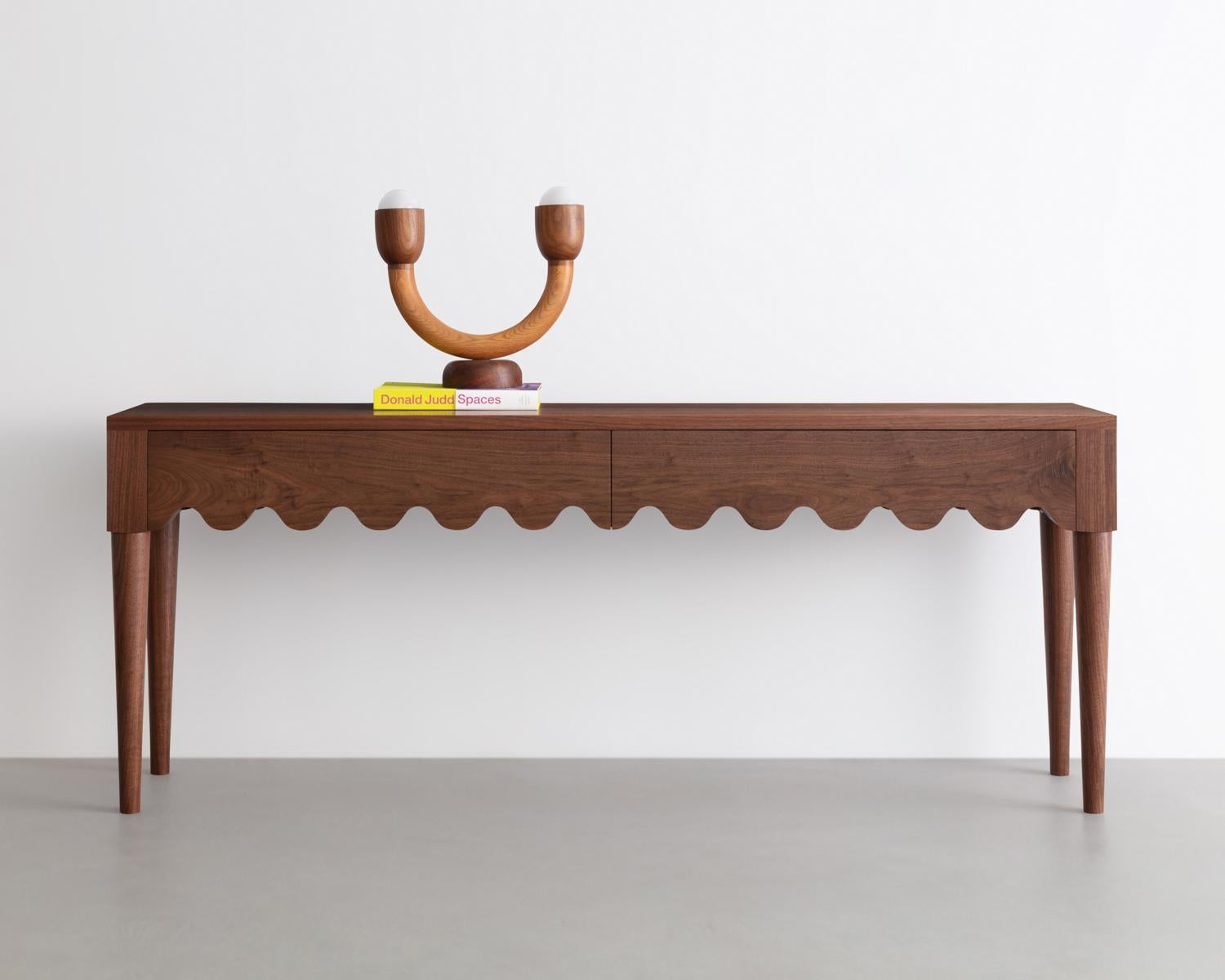 scalloped console table