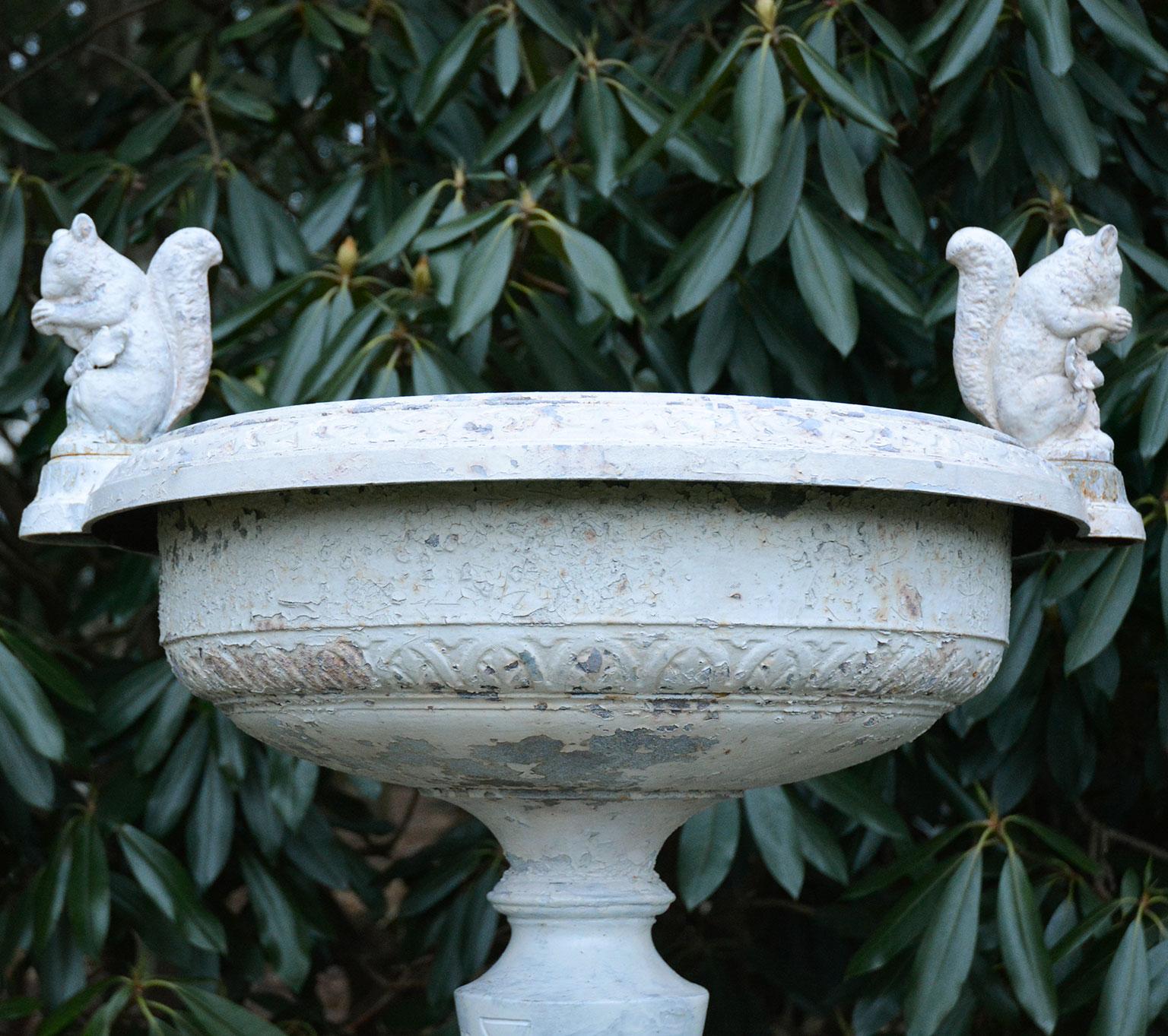 A cast-iron tazza-form urn with squirrel handles, marked “Abendroth NY”.

William, Augustus, and John Abendroth were German immigrants who owned the eponymous firm. Beginning in 1841, the brothers ran a well-managed factory producing stoves and