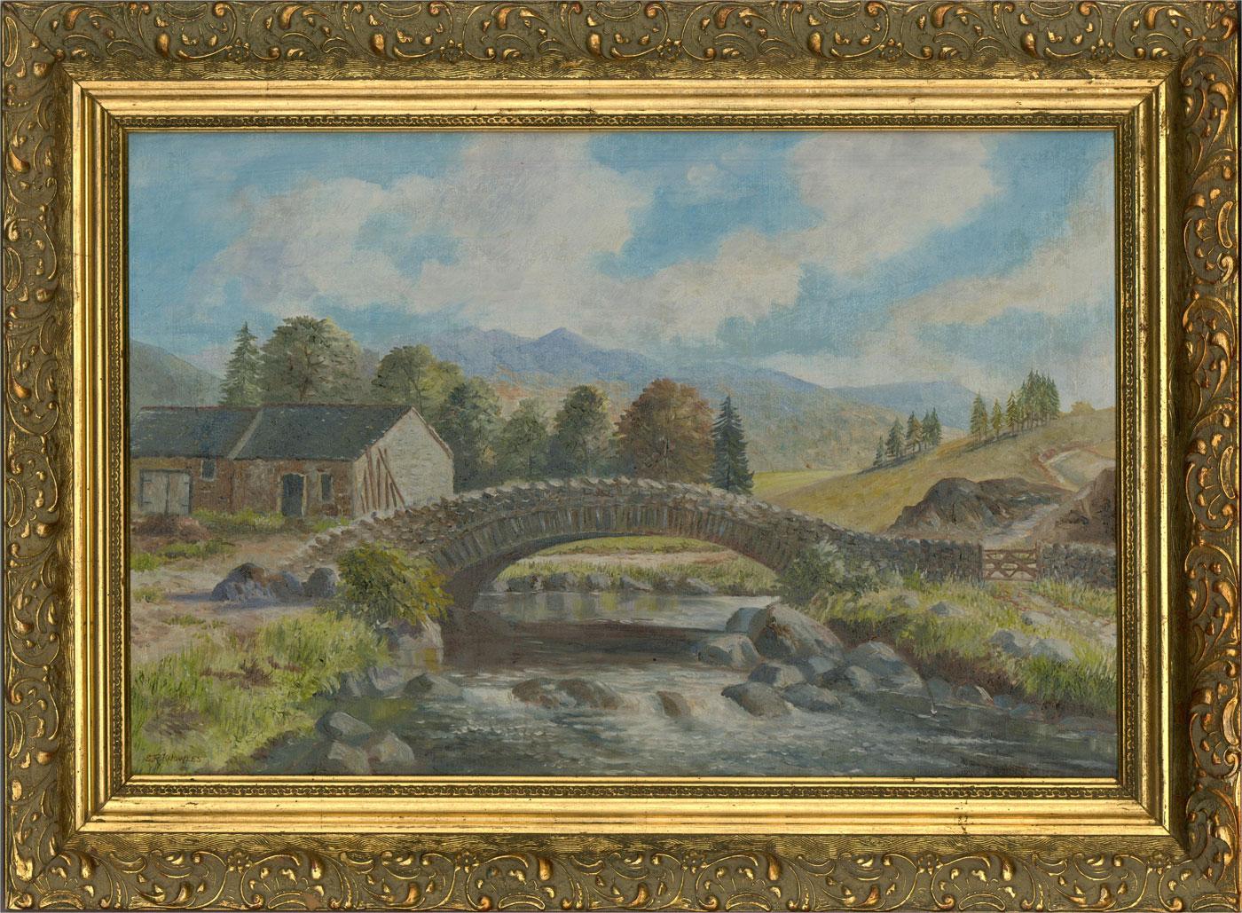 A rural view of an old packhorse bridge in Cumbria. Presented in an ornate gilt-effect wooden frame. Signed to the lower-left edge. There is a label on the verso inscribed, 'Old packhorse bridge at Watendlath, nr. Keswick, Cumbria'. On canvas board.
