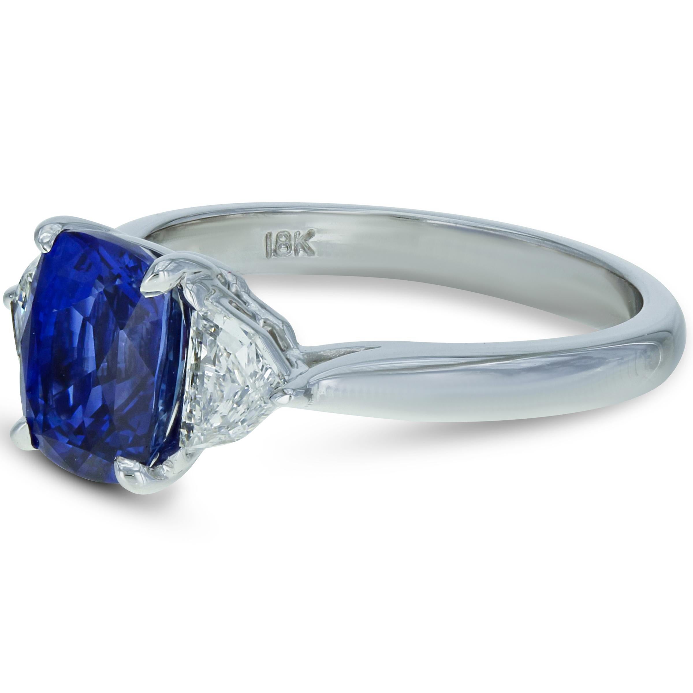 Sri Lanka Blue Sapphire And Diamond Engagement Ring 3.34cttw 18K White Gold GIA

Details:
Royal blue sapphire diamond engagement ring.
Sri Lanka sapphires are probably the worlds most famous and sought after sapphires due to the color in the blues