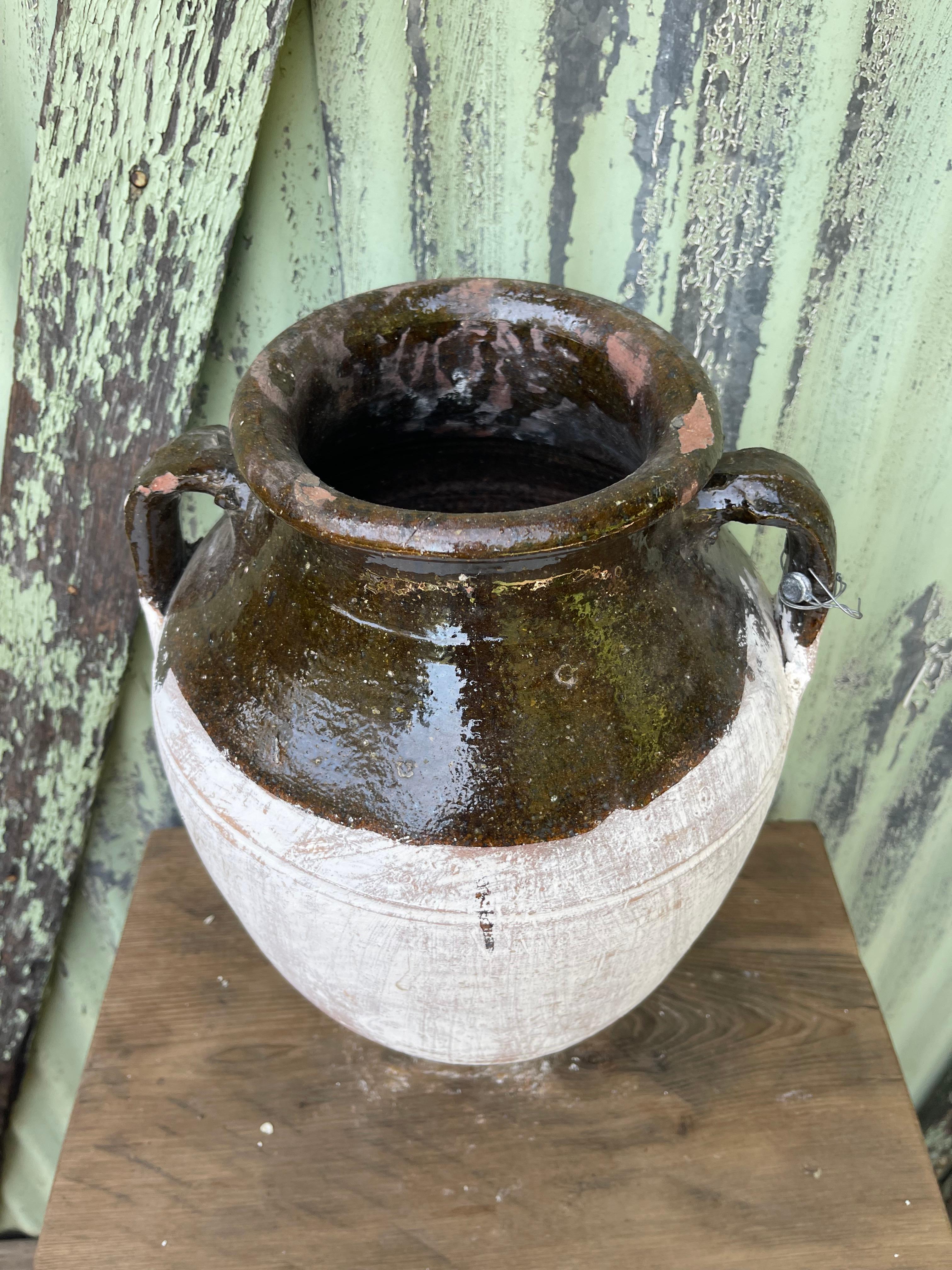 This set of medium glazed küps was likely used for wine, water, goat's milk, or cheese by generations of families in the Levant. This traditional glazing technique, popular on Konya pottery wheels, is as functional as it is beautiful. The glaze