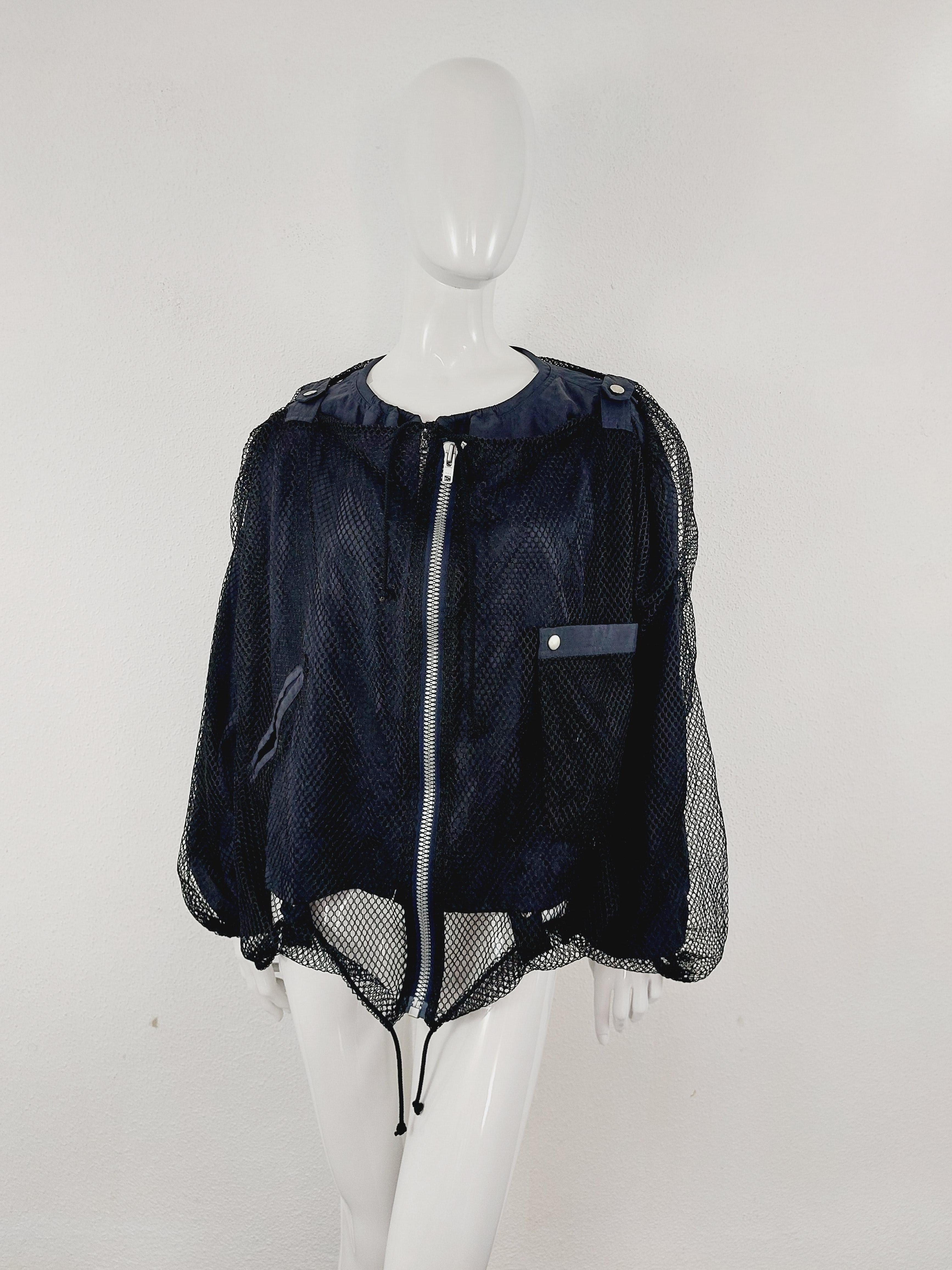 SS 1992 Runway Issey Miyake Double Layered Mesh Fishnet Net Tactical Nylon Cargo Bomber Jacket
Runway piece from the Issey Miyake Collection & Fashion Show 1992 Spring / Summer.
Museum piece in excellent condition, without any signs of wear.
Season: