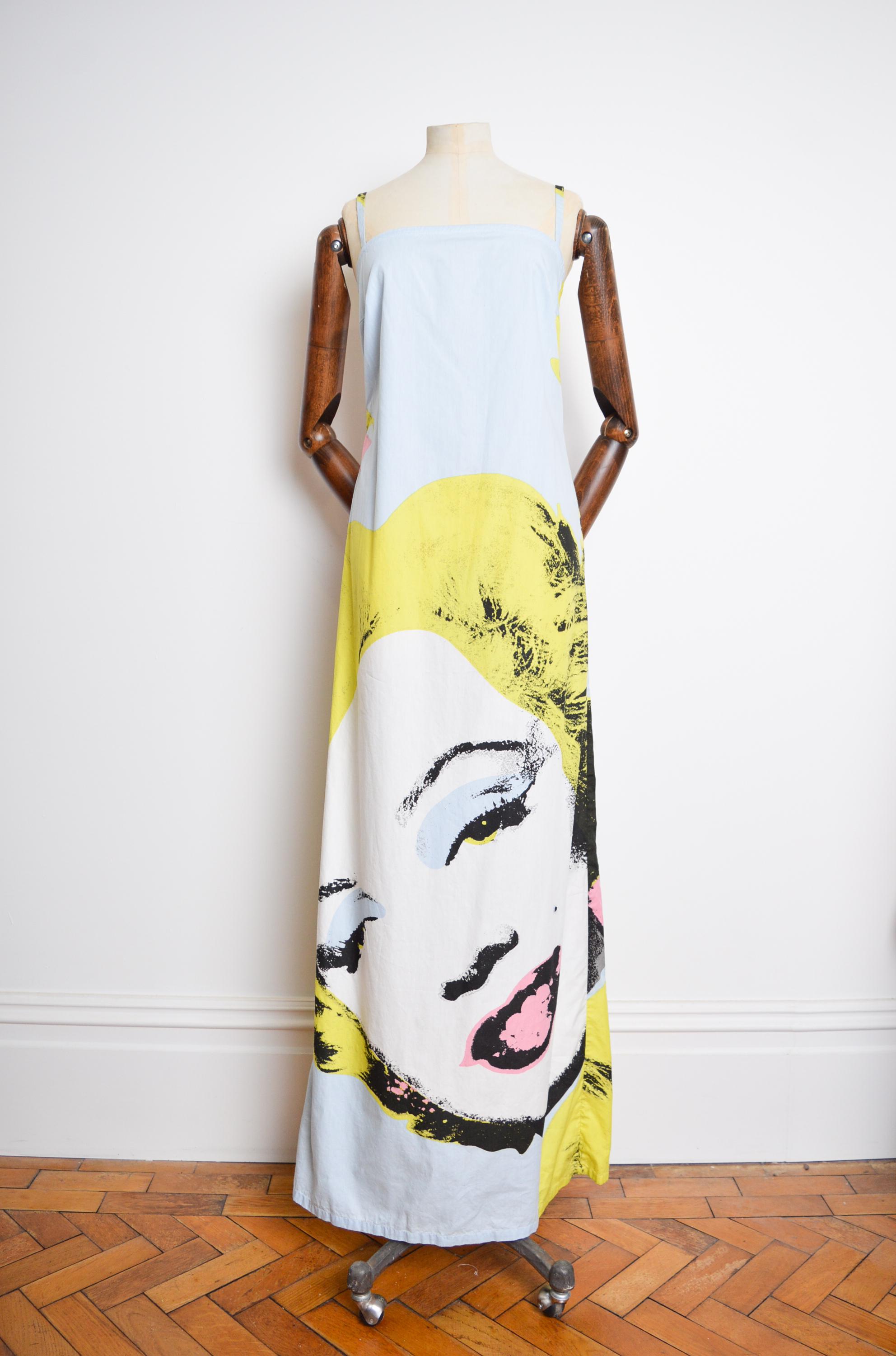Spring /Summer 2000 ICEBERG, Pastel Coloured Monroe pop-art Dress designed by Jean Charles de Castelbajac.

MADE IN ITALY.

The Dress features Spaghetti strap shoulders, A-line shape, Concealed zip up back, Andy Warhol Printed front and reverse,