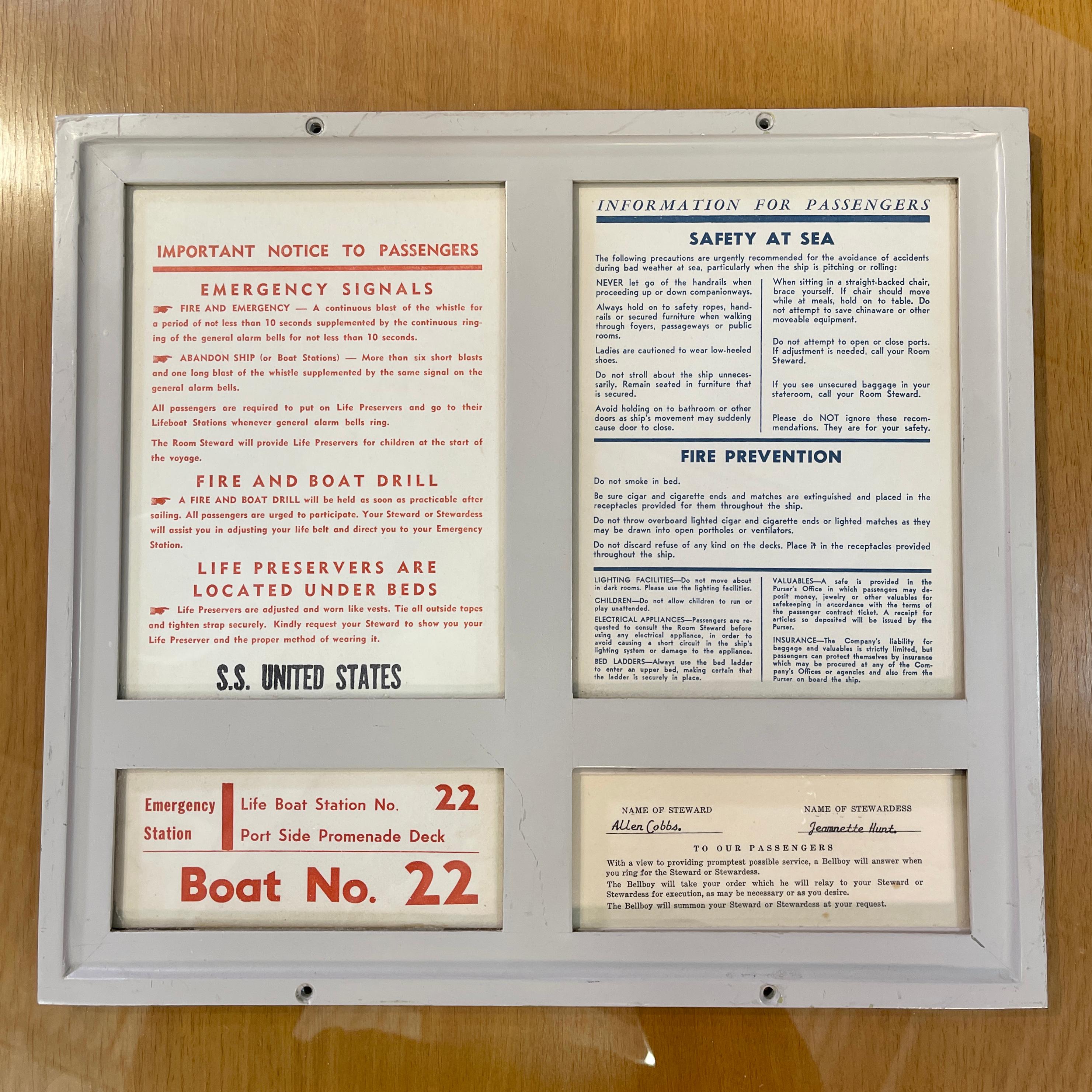 Hefty enameled solid aluminum framed passenger safety and information sign from Passenger Stateroom 139 on the Main deck of the SS United States. 
Four glass paned windows. Lower right window is a pull-out sign plate identifying that assigned to