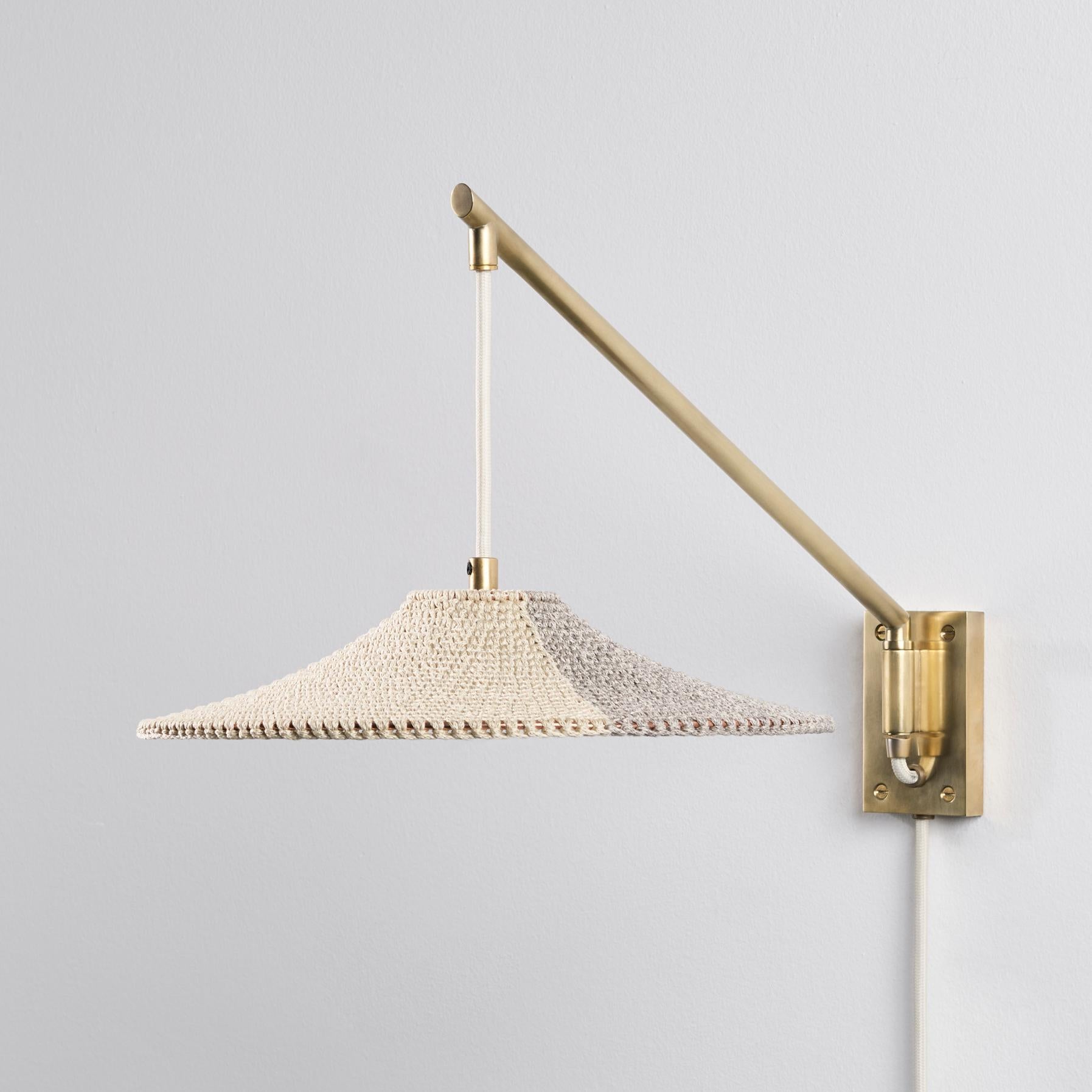 A direct light source, pivoting left and right for easy adjustment of light focus. SS01 Wall Arm Short is perfect to create a relaxed atmosphere for bedside lighting.

Our pendants and lighting designs are made using 100% Egyptian mercerised cotton