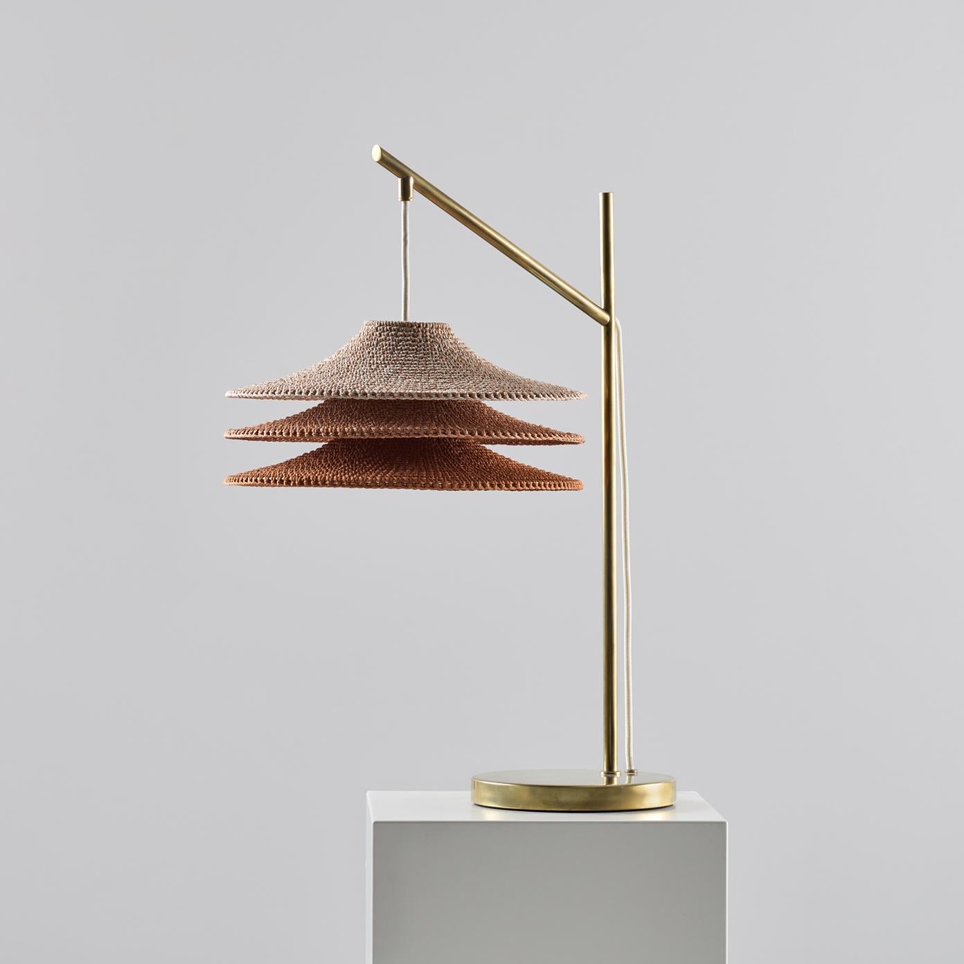 A direct light source, beautiful on a table in a social area, or as a desk lamp.

Our pendants and lighting designs are made using 100% Egyptian mercerised cotton cord. The yarn is first spun and dyed in Italy before being knitted into our signature