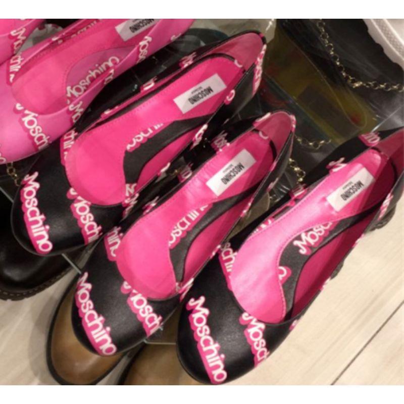 SS15 Moschino Couture Jeremy Scott Barbie Black Pink Logo Flat Ballet Shoes 35

Additional Information:
Material: Leather
Color: Black/Baby Pink/White
Pattern: All Over Barbie Moschino Logo
Style: Ballet Flats    
Size: 35 EU / US 5
100%