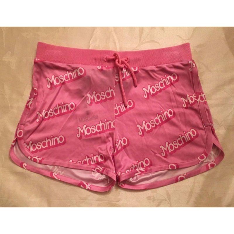 SS15 Moschino Couture Jeremy Scott Barbie Logo Satin Shorts Baby Pink Think Pink

Additional Information:
Material: 100% Rayon
Color: Baby Pink
Pattern: Moschino-Barbie Logo
Style: Athletic
Size: 44
100% Authentic!!!
Condition: Brand new with tags