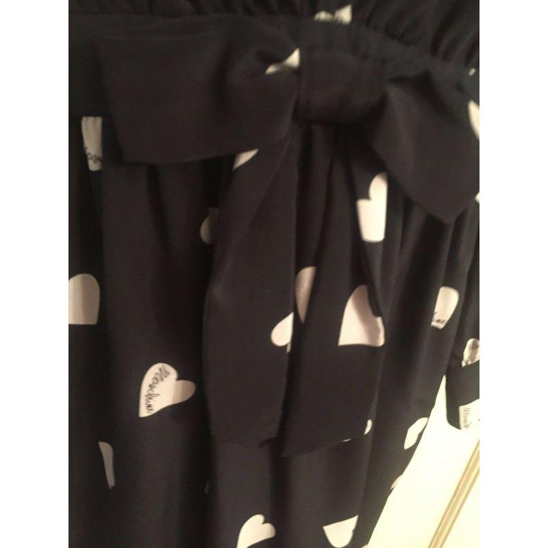 SS15 Moschino Couture x Jeremy Scott Black Silk Heart Print Dress with Front Bow In New Condition For Sale In Palm Springs, CA