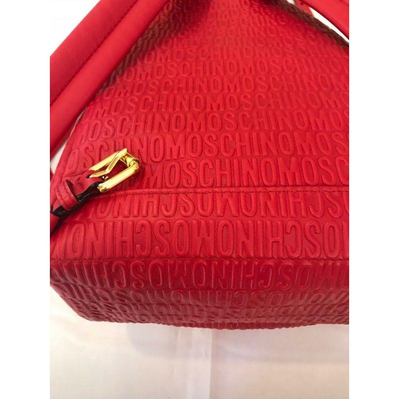 SS17 Moschino Couture Jeremy Scott Red Leather Backpack Wall Over Embossed Logo For Sale 8