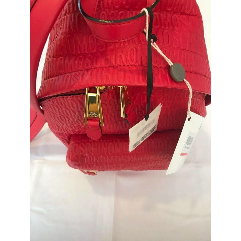 SS17 Moschino Couture Jeremy Scott Red Leather Backpack Wall Over Embossed Logo For Sale 3