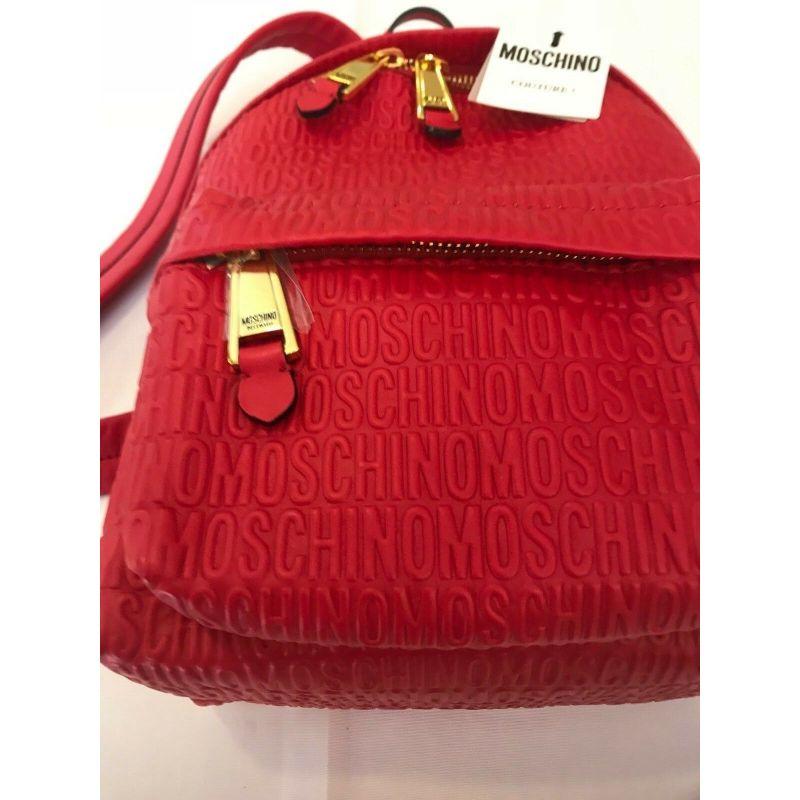 SS17 Moschino Couture Jeremy Scott Red Leather Backpack Wall Over Embossed Logo For Sale 4