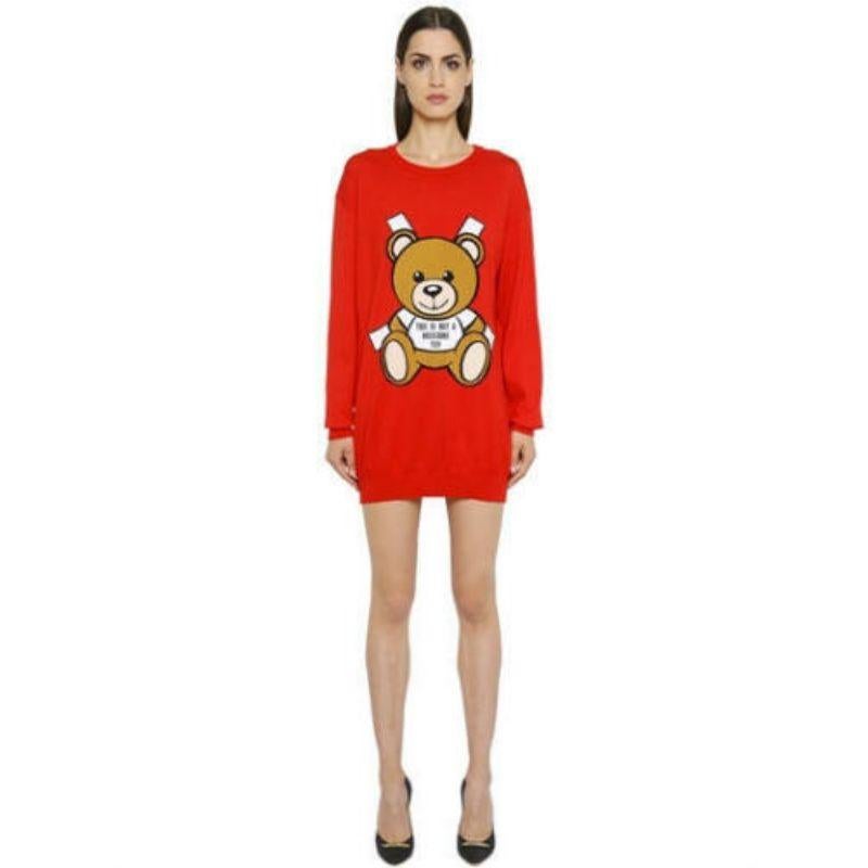 SS17 Moschino Couture Jeremy Scott Teddy Bear Paper Doll Red Intarsia Dress

Additional Information:
Material: 100% Cotton	
Color: Red/Brown/White	
Pattern: Teddy Bear Paper Doll
Style: Pullover / Jumper
Size : 36, 40 IT
100% Authentic!!!
Condition: