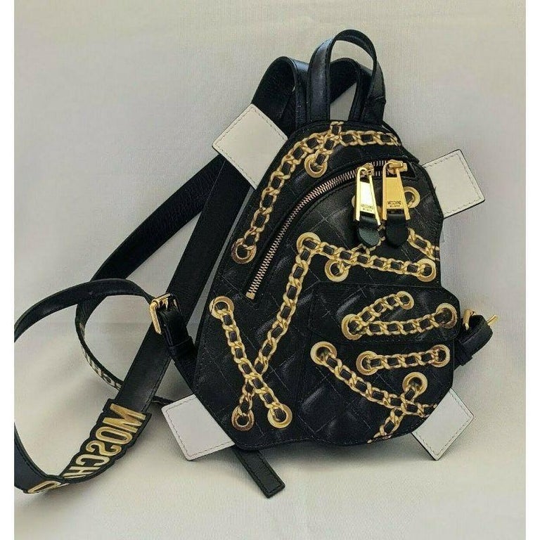 SS17 Moschino Couture Jeremy Scott Trompe L'oeil Black Leather Backpack

Additional Information:
Material: Lambskin Leather
Color: Black/Gold/White
Character: Trompe L'oeilStyle: Casual
Dimension: 9.5 W x 2.2 D x 7 H in
Style: Backpack
Theme: 3D