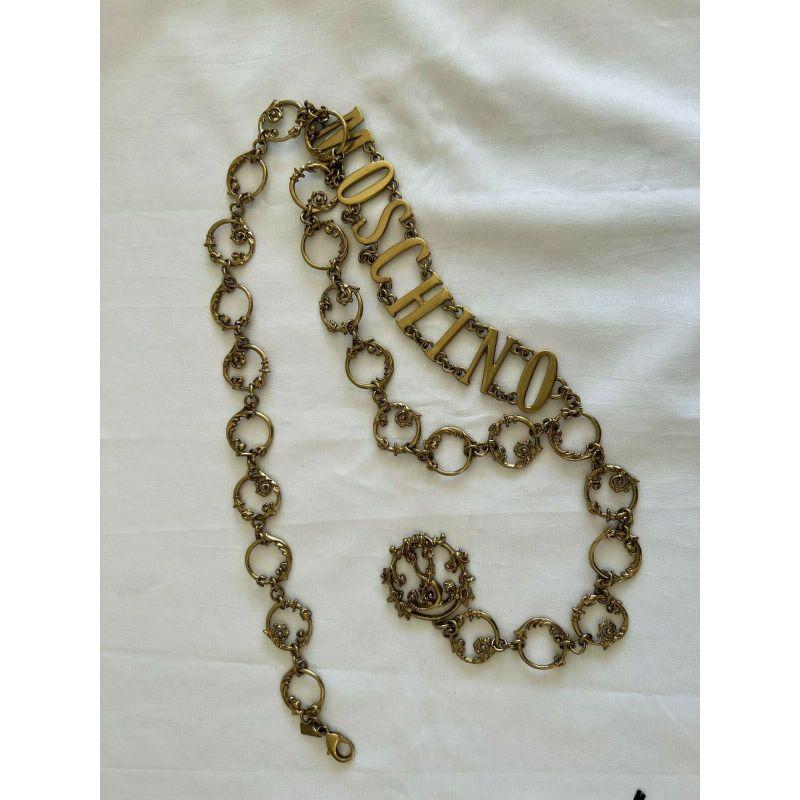 SS19 Moschino Couture Jeremy Scott Logo W/ 'shrubs on Metal Gate' Gold Dress Belt en vente 5