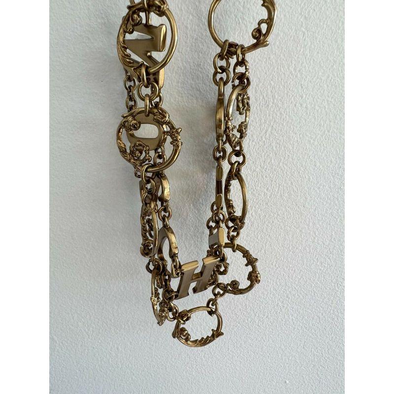 SS19 Moschino Couture Jeremy Scott Logo W/ 'shrubs on Metal Gate' Gold Dress Belt en vente 3