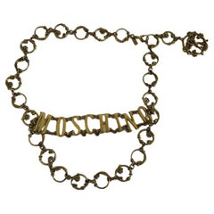 Used SS19 Moschino Couture Jeremy Scott Logo W/'shrubs on Metal Gate' Gold Dress Belt