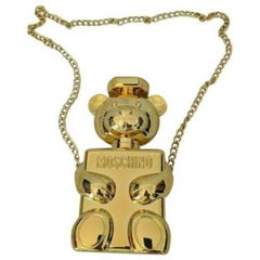 Sac à bandoulière en forme de bouteille de parfum Moschino Couture Jeremy Scott Teddy Bear SS19