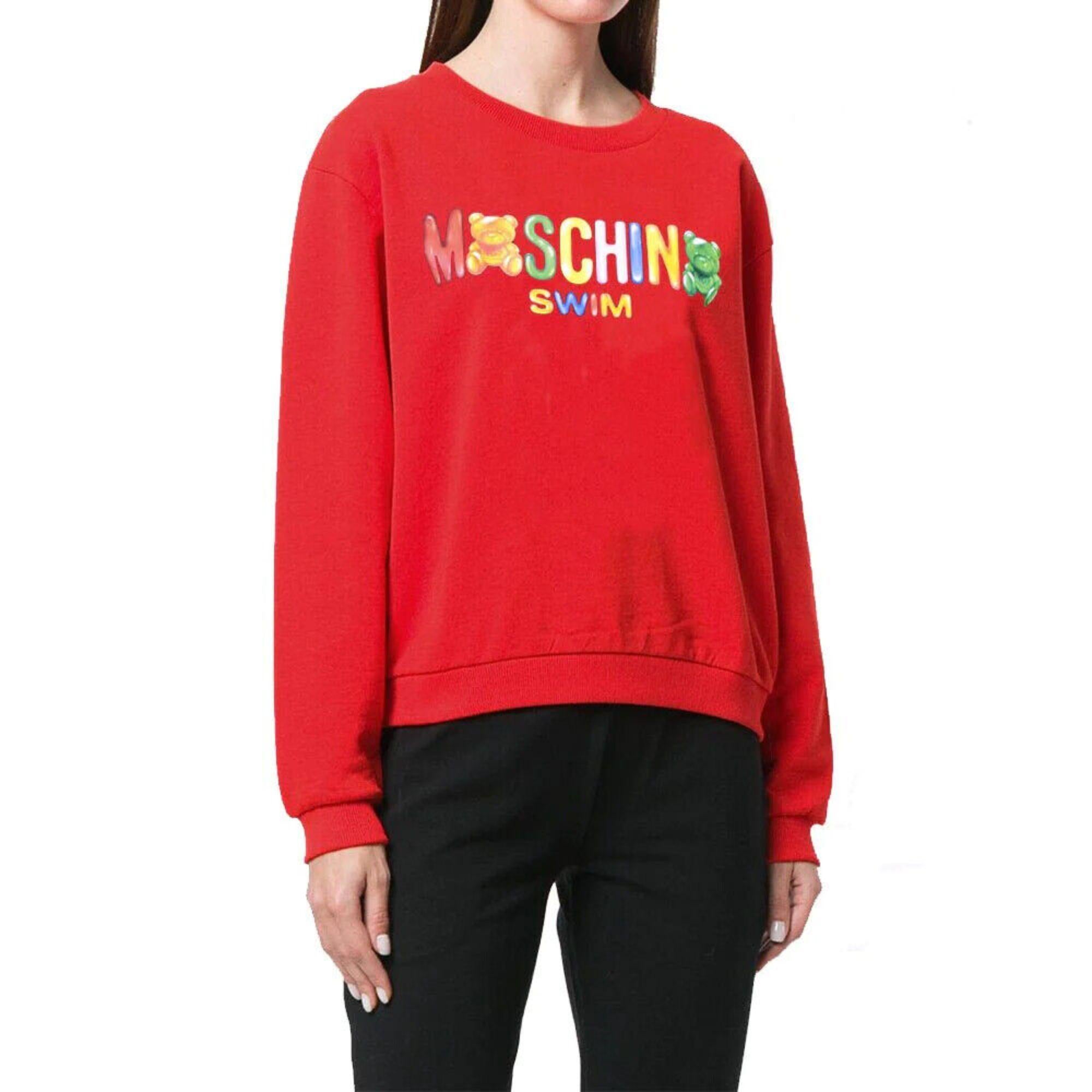 SS19 Moschino Swim Jeremy Scott Swim Jelly Gummy Teddy Bear Red Sweatshirt Candy

Additional Information:
Material: 100% Cotton
Color: Red
Size: L / US M
Style: Pullover
Pattern: Logo, Gummy Bear
Dimensions: Shoulder to shoulder 18.5