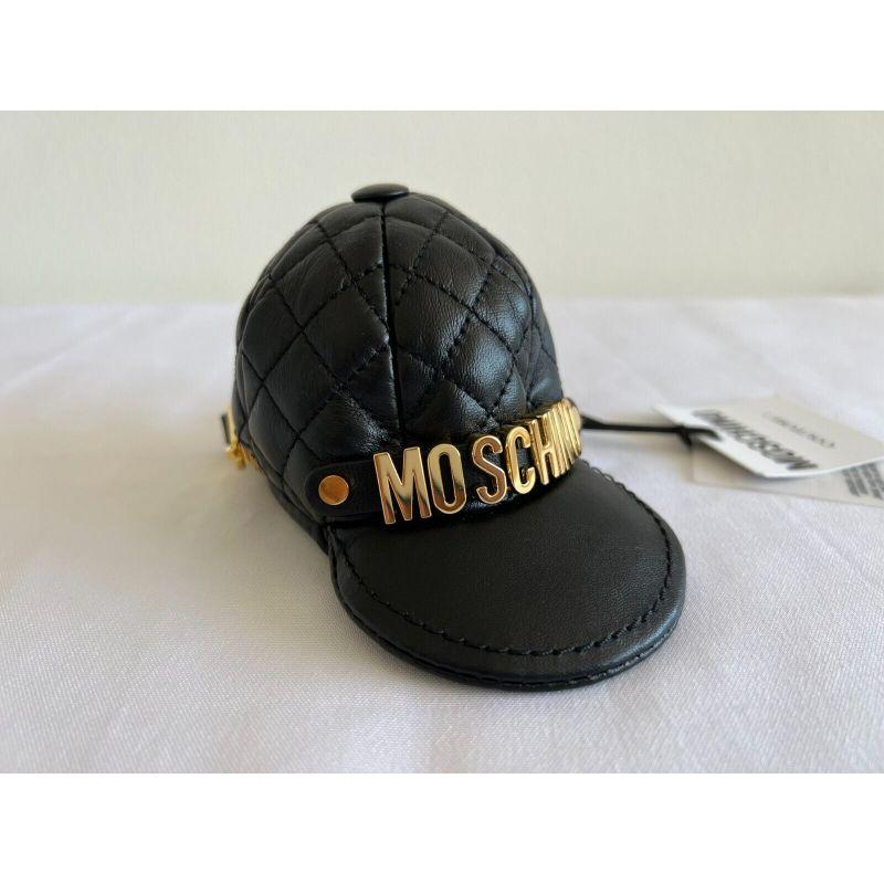 SS20 Moschino Couture Jeremy Scott Baseball Cap Shaped Logo Leather Keychain

Additional Information:
Material: Leather
Color: Black, Gold
Pattern: Basball Cap
Size: S
Dimensions: 5