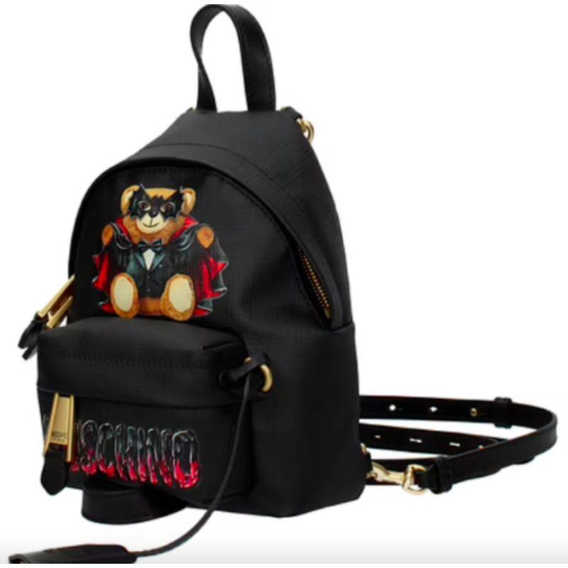 SS20 Moschino Couture Jeremy Scott Bat Teddy Bear Black Mini Backpack Halloween

Additional Information:
Material: PU Leather/Polyurethane, Leather Details
Color: Black/Multi-color
Pattern: Textured
Style: Backpack
Dimension: 5.7 W x 4.9 D x 7.8 H
