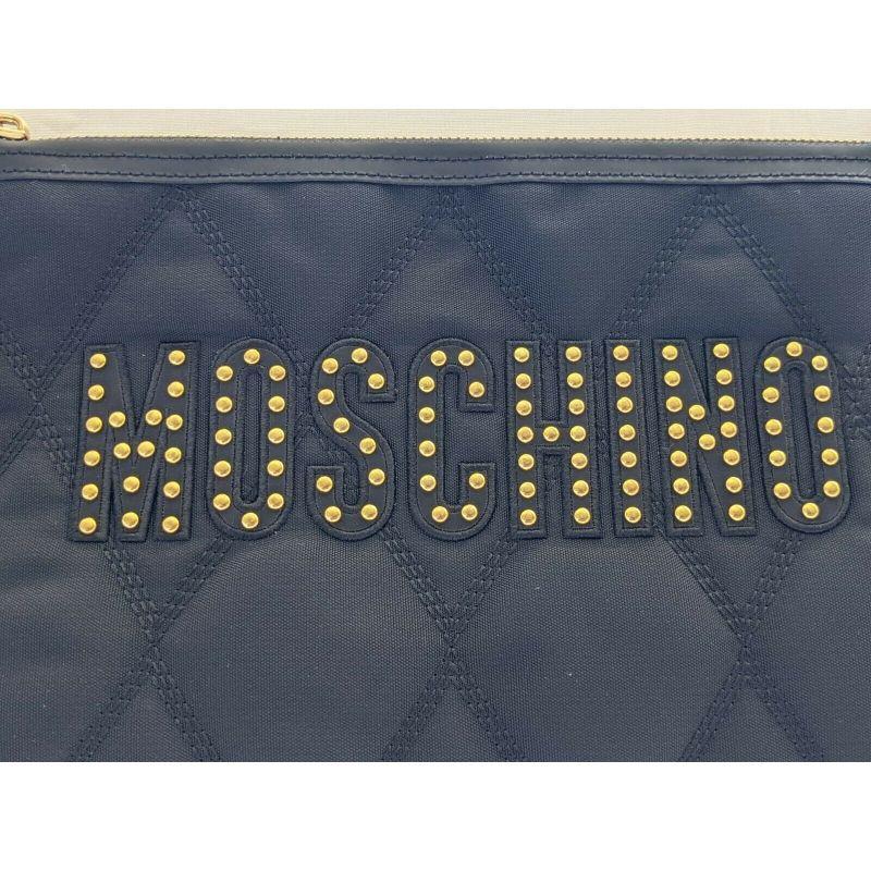 SS20 Moschino Couture Jeremy Scott Black Nylon Clutch With Gold Studded Logo For Sale 1