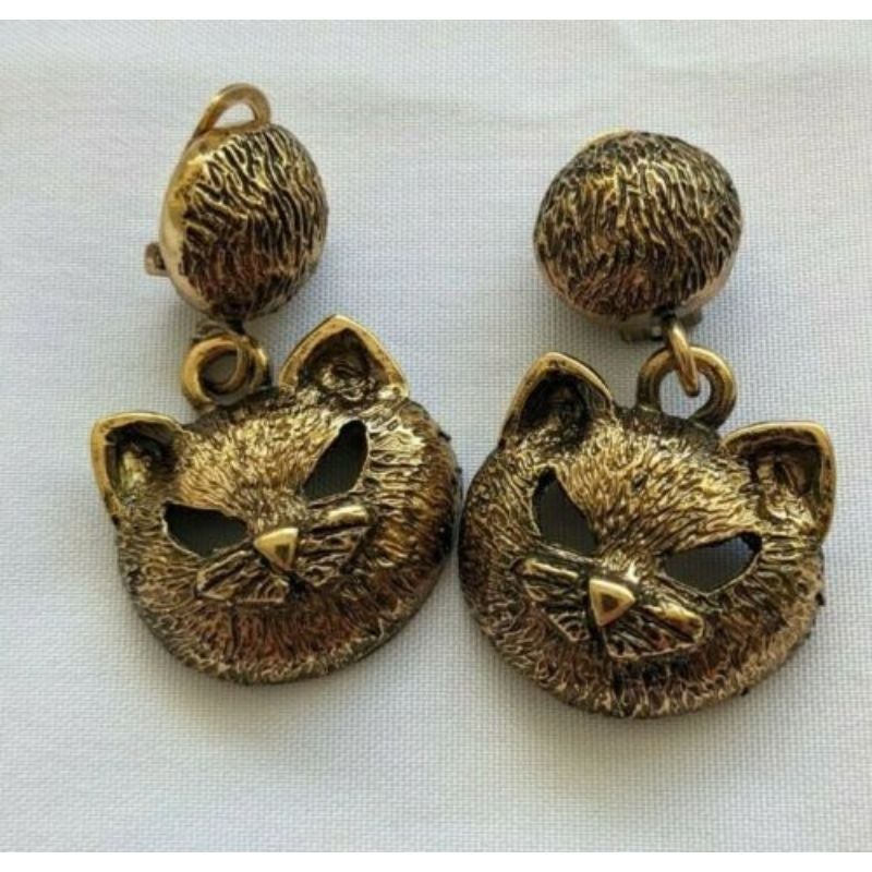 Modern SS20 Moschino Couture Jeremy Scott Gold Cat Eye Clip On Earrings Trick or Chic For Sale