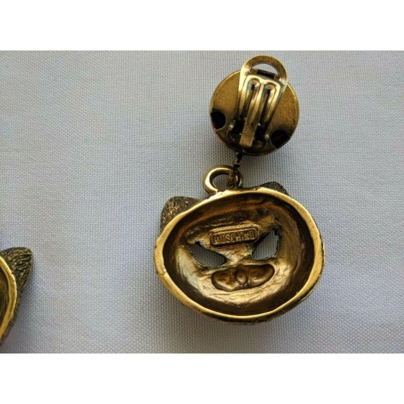 Women's SS20 Moschino Couture Jeremy Scott Gold Cat Eye Clip On Earrings Trick or Chic For Sale