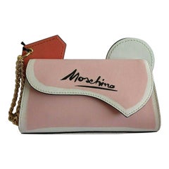 SS20 Moschino Couture Jeremy Scott Borsa a mano in pelle rosa con logo Collezione Picasso