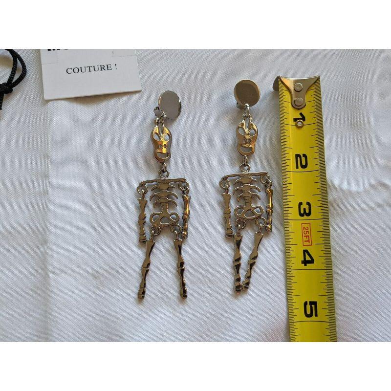 SS20 Moschino Couture Jeremy Scott Skeleton Silver Clip on Earrings 'Trick/Chic' For Sale 5
