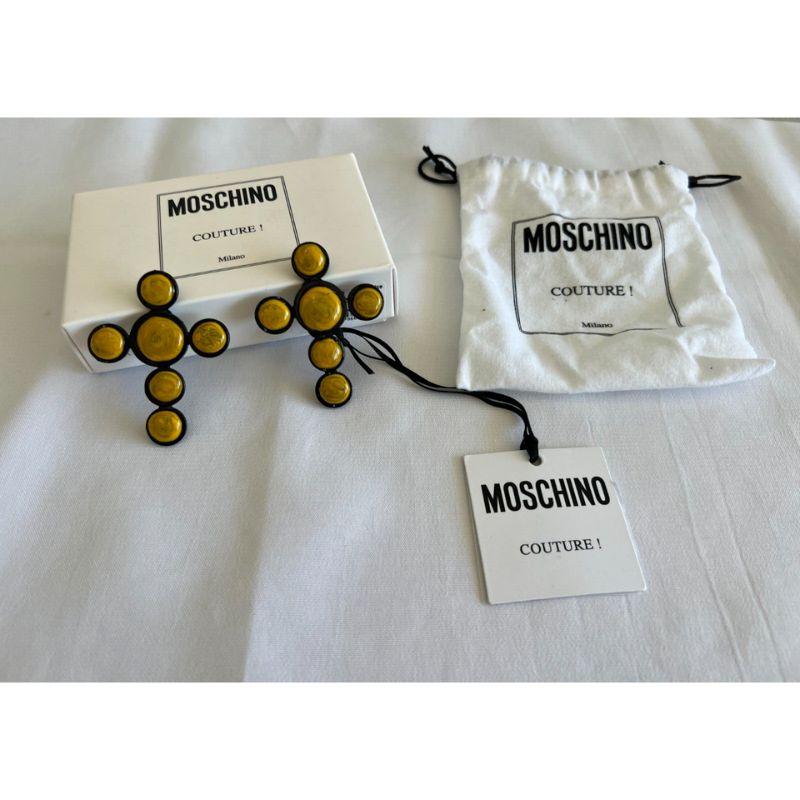 SS20 Moschino Couture Jeremy Scott Picasso Yellow Cross Clip On Drop Earrings

Additional Information:
Material: Metal
Color: Yellow
Pattern: Cross
Style: Clip
Dimensions: 2.5