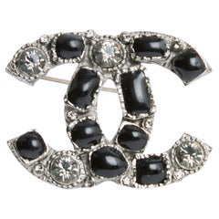 Vintage SS2009 Chanel CC Silver Metal and black cabochons