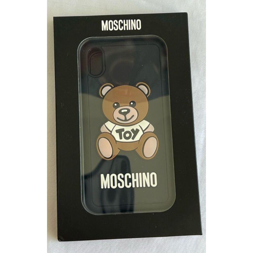 SS21 Moschino Couture Jeremy Scott Black iPhone XS Max Case with Teddy Bear Toy

Additional Information:
Material: 40% PVC, 40% Polycarbonate, 20% PU
Color: Black, White, Brown
Size: One Size
Pattern: Solid, 3D Logo Details, 3D Teddy