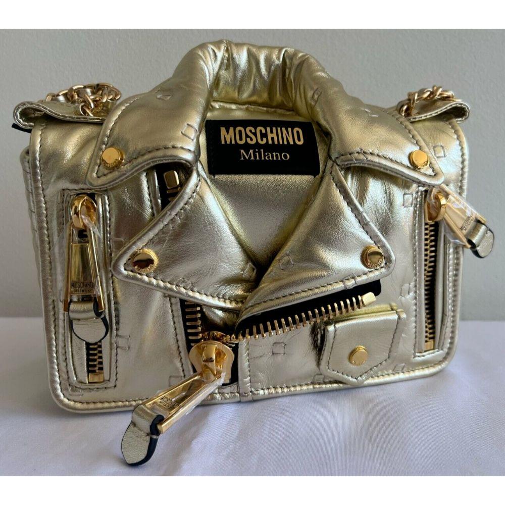 SS21 Moschino Couture Jeremy Scott Gold Biker Jacket Shoulder Bag Gold Hardware

Additional Information:
Material:  - 100% PO
Color: Gold
Size: Medium
Pattern: Solid, Biker Jacket
Style: Shoulder Bag
Dimensions: 9.5