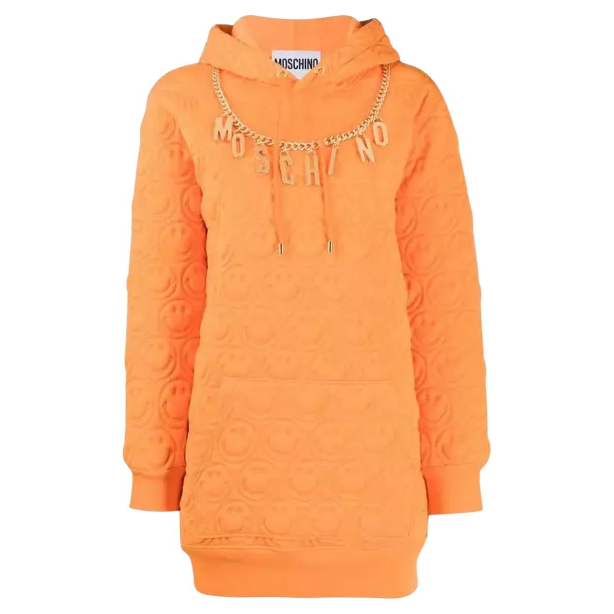 SS21 MOSCHINO Couture Jeremy Scott Orange Smiley Gold Logo Charms Hoodie Dress en vente