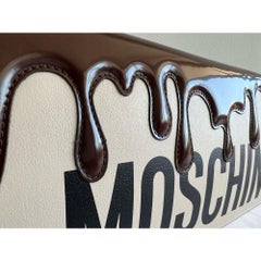 SS22 Moschino Couture Chocolate Dripping Wristlet Handbag by Jeremy Scott