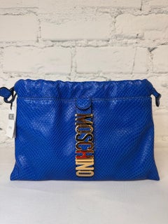 SS22 MOSCHINO Couture Jeremy Scott Blue Leather Shoulder Bag Gold Vertical Logo