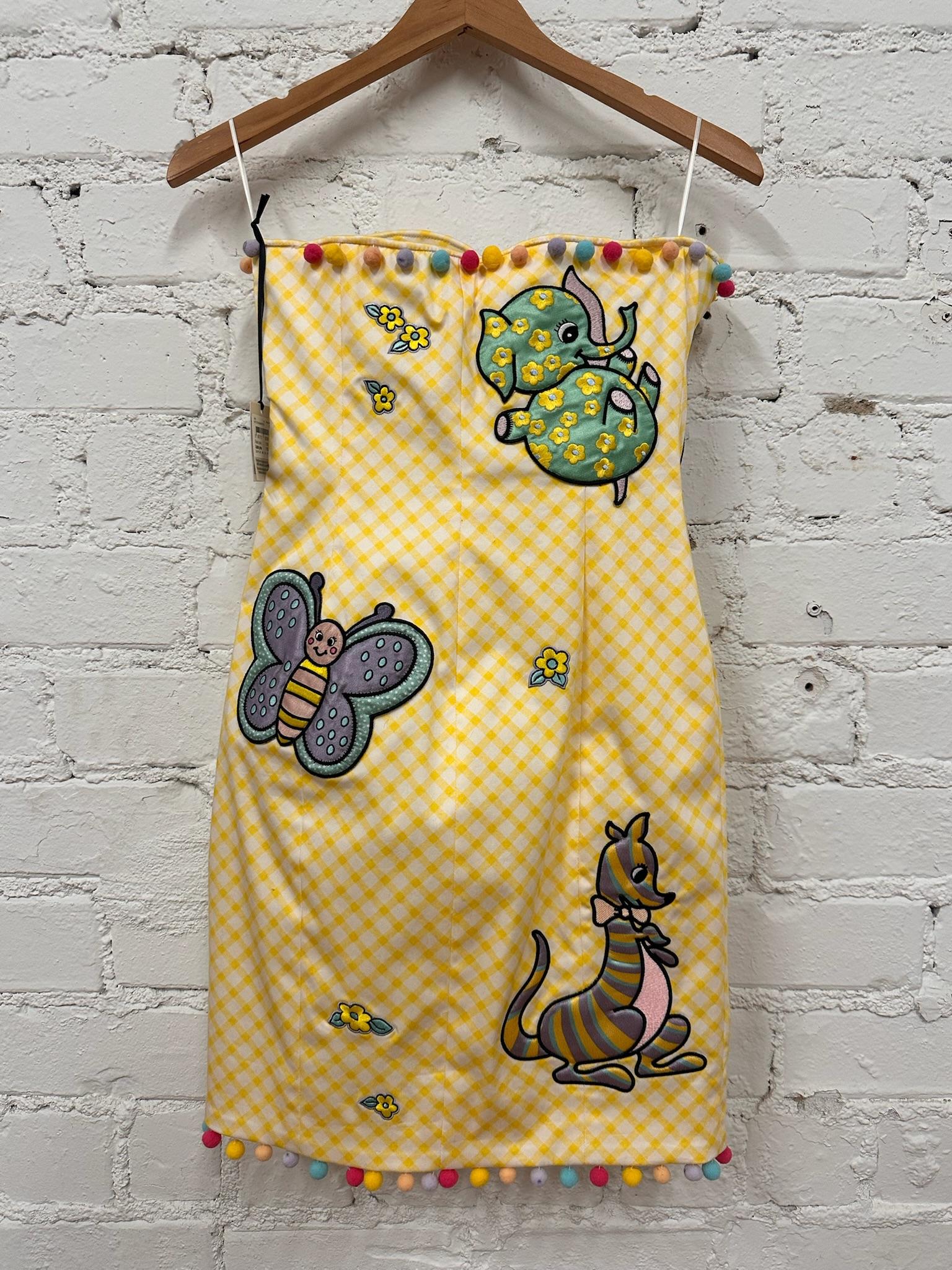 SS22 Moschino Couture Jeremy Scott - Vestito da bambino con orlo a griglia gialla e fantasia di pom pom in vendita 6